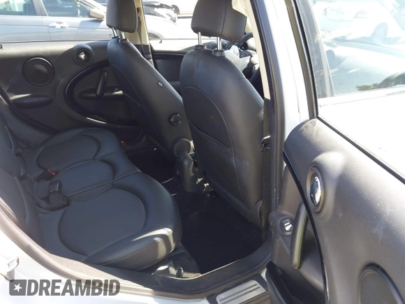 2013 MINI Countryman with VIN WMWZB3C52DWR35806, listed as a IAAI auction lot 42184010 with 93,380 mi miles and . Bid and sale history available at DreamBid. Image 8.