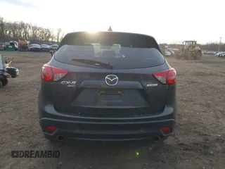 2015 Mazda CX-5 Grand Touring with VIN JM3KE4DY5F0470445, listed as a IAAI auction lot 41236468 with 87,845 mi miles. Bid and sale history available at carsss.com. Image 16.