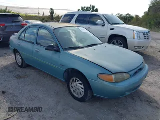 1998 Ford Escort LX with VIN 1FALP13P9WW103307, listed as a IAAI auction lot 40681877 with 1 mi miles. Bid and sale history available at carsss.com. Image 1.