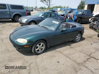 2000 Mazda MX-5 Miata with VIN JM1NB3533Y0151883, listed as a Copart auction lot 64423925 with 180,275 mi miles and Salvage title. Bid and sale history available at DreamBid. Image 1.