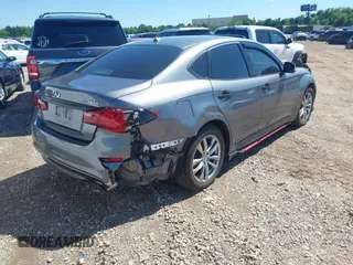 2015 Infiniti M Hybrid with VIN JN1EY1AP2FM510029, listed as a IAAI auction lot 41795913 with 152,475 mi miles. Bid and sale history available at carsss.com. Image 4.