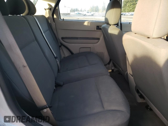 2009 Ford Escape XLS with VIN 1FMCU92709KD07634, listed as a Copart auction lot 42264585 with 155,108 mi miles and Clean title. Bid and sale history available at DreamBid. Image 11.
