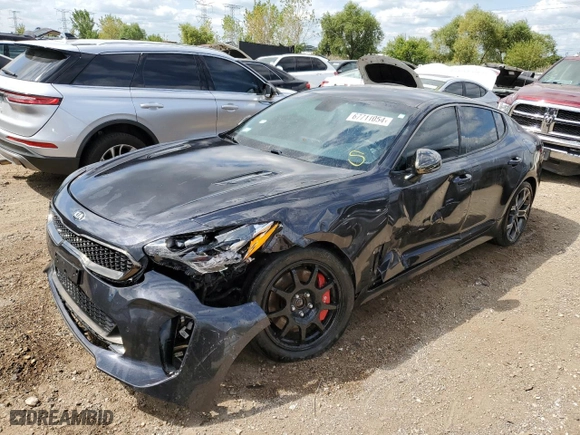 2021 Kia Stinger GT with VIN KNAE35LC2M6089778, listed as a Copart auction lot 67711054 with 76,690 mi miles and Salvage Title. Bid and sale history available at carsss.com. Image 1.