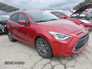2019 Toyota Yaris L z VIN 3MYDLBYV6KY511548, wystawiony jako IAAI lot #41725445 z przebiegiem 62 628 mil mil oraz . Historia ofert i sprzedaży dostępna na DreamBid. Obrazek 1.