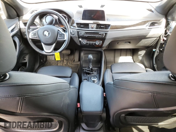 2018 BMW X1 sDrive28i with VIN WBXHU7C38J3H42948, listed as a Copart auction lot 52061793 with 26,991 mi miles and . Bid and sale history available at DreamBid. Image 8.