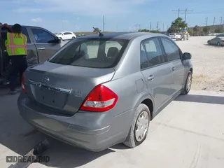 2010 Nissan Versa 1.8 S with VIN 3N1BC1AP0AL365397, listed as a IAAI auction lot 41987852 with 183,952 mi miles. Bid and sale history available at carsss.com. Image 4.