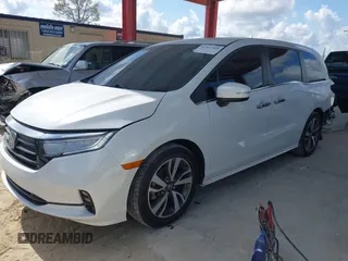 2021 Honda Odyssey Touring z VIN 5FNRL6H80MB003323, wystawiony jako IAAI lot #42303968 z przebiegiem 51 531 mil mil oraz . Historia ofert i sprzedaży dostępna na DreamBid. Obrazek 18.