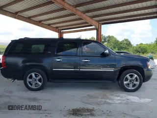 2011 Chevrolet Suburban LTZ with VIN 1GNSKKE3XBR180241, listed as a IAAI auction lot 42365771 with 231,477 mi miles and . Bid and sale history available at DreamBid. Image 13.