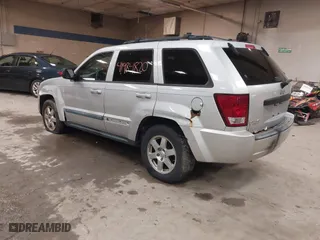 2009 Jeep Grand Cherokee Laredo with VIN 1J8GR48K89C553694, listed as a IAAI auction lot 41984820 with 196,266 mi miles. Bid and sale history available at carsss.com. Image 3.