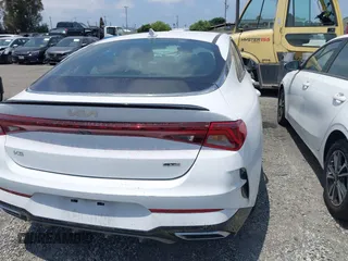 2023 Kia K5 GT-Line z VIN 5XXG64J25PG220733, wystawiony jako IAAI lot #42109640 z przebiegiem 30 917 mil mil oraz . Historia ofert i sprzedaży dostępna na DreamBid. Obrazek 17.