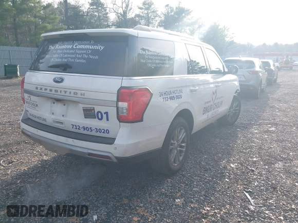 2022 Ford Expedition XLT with VIN 1FMJU1JT1NEA27995, listed as a IAAI auction lot 40935076 with 154,139 mi miles. Bid and sale history available at carsss.com. Image 4.