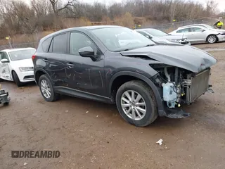2016 Mazda CX-5 Touring with VIN JM3KE4CY7G0715507, listed as a IAAI auction lot 41699610 with 108,206 mi miles. Bid and sale history available at carsss.com. Image 1.