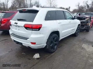2015 Jeep Grand Cherokee Altitude with VIN 1C4RJFAG7FC954853, listed as a IAAI auction lot 40988796 with 107,002 mi miles. Bid and sale history available at carsss.com. Image 4.