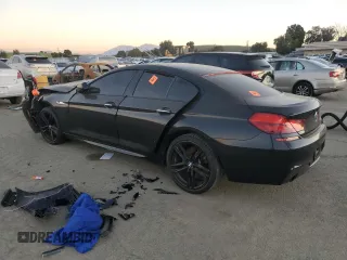 2015 BMW 6 Series 640i z VIN WBA6A0C59FD318390, wystawiony jako Copart lot #87831165 z przebiegiem Nie podano mil oraz Szkoda całkowita • Salvage title. Historia ofert i sprzedaży dostępna na DreamBid. Obrazek 2.