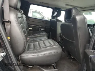 2006 Hummer H2 z VIN 5GRGN23U66H116855, wystawiony jako Copart lot #56010175 z przebiegiem 217 798 mil mil oraz Tytuł czysty. Historia ofert i sprzedaży dostępna na DreamBid. Obrazek 11.