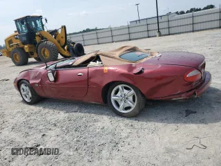 1999 Jaguar XK with VIN SAJGX204XXC038435, listed as a Copart auction lot 64843714 with Not Provided miles and Salvage Title. Bid and sale history available at DreamBid. Image 2.