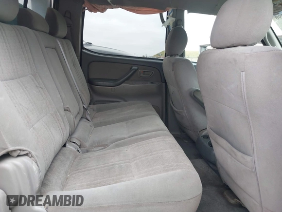 2005 Toyota Tundra SR5 with VIN 5TBDT441X5S479169, listed as a IAAI auction lot 42058790 with 323,936 mi miles and . Bid and sale history available at DreamBid. Image 8.