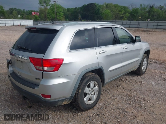 2011 Jeep Grand Cherokee Laredo with VIN 1J4RS4GGXBC564035, listed as a IAAI auction lot 41931861 with 242,291 mi miles and . Bid and sale history available at DreamBid. Image 4.