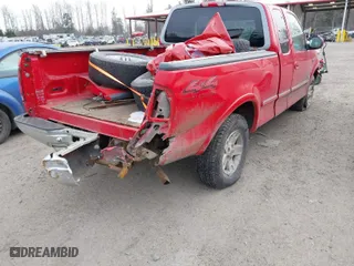 1998 Ford F-150 Standard with VIN 1FTRX18L6WKB01340, listed as a IAAI auction lot 41566198 with 199,223 mi miles. Bid and sale history available at carsss.com. Image 6.