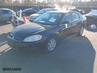 2011 Chevrolet Impala Police Police with VIN 2G1WD5EM6B1251953, listed as a IAAI auction lot 40972078 with 106,935 mi miles. Bid and sale history available at carsss.com. Image 18.