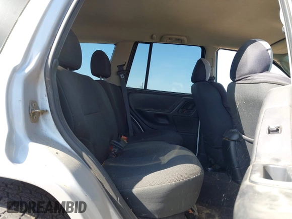 2003 Jeep Grand Cherokee Laredo with VIN 1J4GX48S03C577759, listed as a IAAI auction lot 41969103 with 91,305 mi miles. Bid and sale history available at carsss.com. Image 8.
