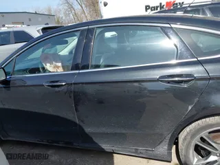 2015 Ford Fusion Titanium with VIN 3FA6P0D91FR277852, listed as a IAAI auction lot 41775806 with 82,684 mi miles. Bid and sale history available at carsss.com. Image 15.
