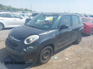 2014 FIAT 500L Pop z VIN ZFBCFAAHXEZ016833, wystawiony jako IAAI lot #42161735 z przebiegiem 137 580 mil mil oraz . Historia ofert i sprzedaży dostępna na DreamBid. Obrazek 2.