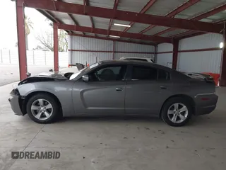 2011 Dodge Charger Rallye with VIN 2B3CL3CGXBH607876, listed as a IAAI auction lot 41778597 with 125,680 mi miles. Bid and sale history available at carsss.com. Image 14.