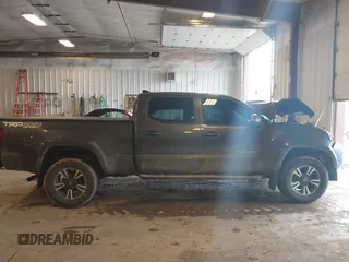 2016 Toyota Tacoma SR5 with VIN 5TFDZ5BN8GX012377, listed as a IAAI auction lot 41688620 with 138,531 mi miles and . Bid and sale history available at DreamBid. Image 13.