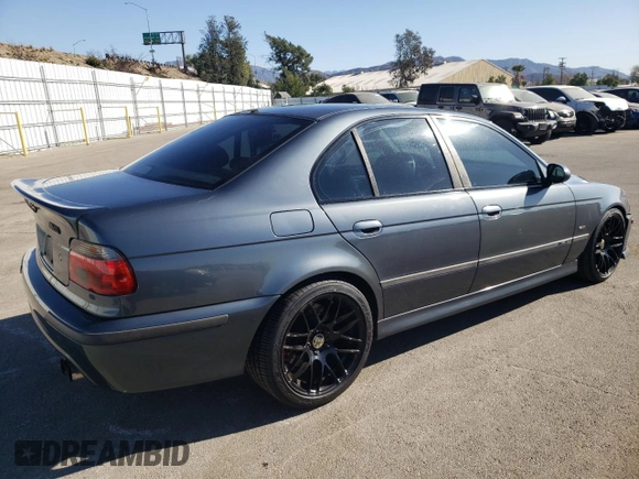 2000 BMW M5 z VIN WBSDE9349YBZ94615, wystawiony jako Copart lot #88802245 z przebiegiem 157 774 mil mil oraz Tytuł czysty. Historia ofert i sprzedaży dostępna na DreamBid. Obrazek 3.