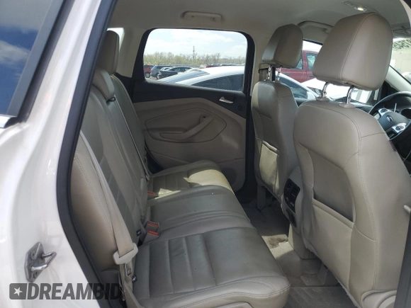 2013 Ford Escape SEL with VIN 1FMCU9H9XDUB08144, listed as a Copart auction lot 52887545 with 142,451 mi miles and Salvage Title. Bid and sale history available at DreamBid. Image 11.
