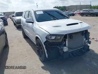 2018 Dodge Durango SRT z VIN 1C4SDJGJ4JC341550, wystawiony jako IAAI lot #42545902 z przebiegiem 866 603 mil mil oraz . Historia ofert i sprzedaży dostępna na DreamBid. Obrazek 1.