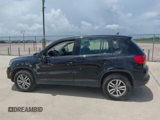 2014 Volkswagen Tiguan SE with VIN WVGAV3AX7EW549326, listed as a IAAI auction lot 42515906 with 102,221 mi miles and . Bid and sale history available at DreamBid. Image 13.