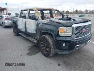 2015 GMC Sierra 1500 Denali z VIN 3GTP1WEC1FG416404, wystawiony jako IAAI lot #41247127 z przebiegiem Nie podano mil oraz . Historia ofert i sprzedaży dostępna na DreamBid. Obrazek 1.