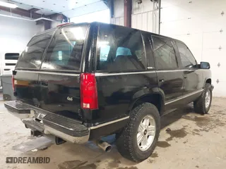 1996 Chevrolet Tahoe with VIN 1GNEK13R8TJ313125, listed as a IAAI auction lot 41361170 with 162,789 mi miles. Bid and sale history available at carsss.com. Image 4.