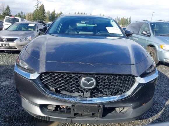 2021 Mazda CX-30 Premium with VIN 3MVDMBDY2MM239231, listed as a IAAI auction lot 41655159 with 22,679 mi miles and . Bid and sale history available at carsss.com. Image 13.