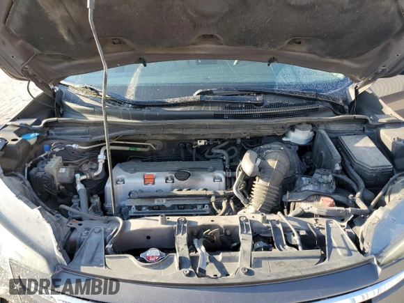 2014 Honda CR-V EX z VIN 2HKRM4H5XEH716398, wystawiony jako Copart lot #48698515 z przebiegiem 121 523 mil mil oraz Szkoda całkowita • Salvage title. Historia ofert i sprzedaży dostępna na DreamBid. Obrazek 11.