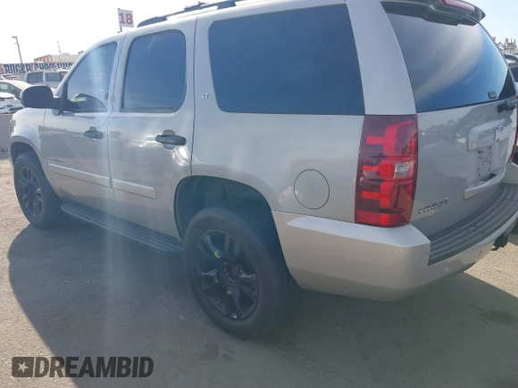 2007 Chevrolet Tahoe LTZ with VIN 1GNFC13077J399911, listed as a IAAI auction lot 41141878 with Not provided miles and . Bid and sale history available at DreamBid. Image 3.