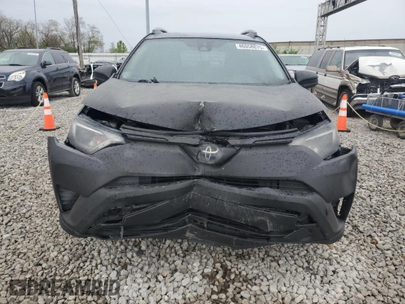 2017 Toyota RAV4 LE with VIN 2T3BFREV1HW616877, listed as a Copart auction lot 46058075 with 66,956 mi miles and Salvage title. Bid and sale history available at DreamBid. Image 5.