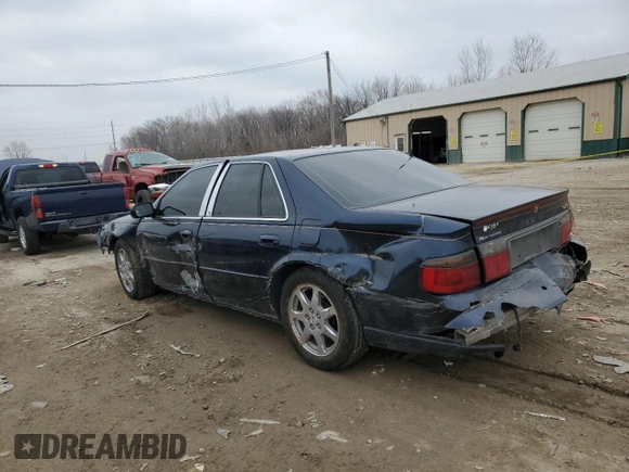 2002 Cadillac Seville Touring STS z VIN 1G6KY54932U174599, wystawiony jako Copart lot #44996845 z przebiegiem 168 819 mil mil oraz Szkoda całkowita • Salvage title. Historia ofert i sprzedaży dostępna na DreamBid. Obrazek 2.