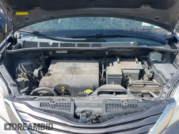 2012 Toyota Sienna LE AAS with VIN 5TDKK3DC8CS180967, listed as a IAAI auction lot 42215961 with 220,089 mi miles and . Bid and sale history available at DreamBid. Image 10.
