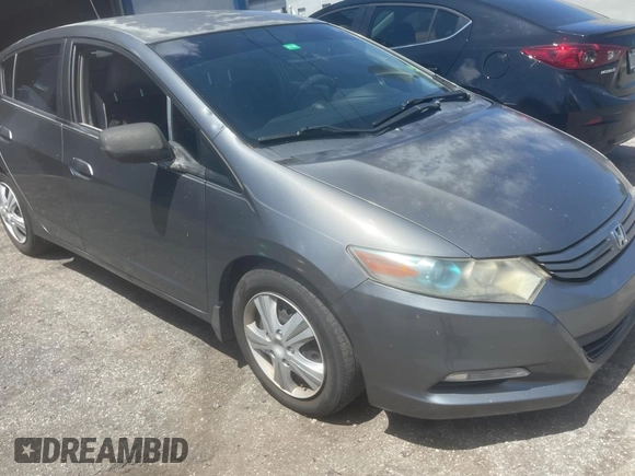 2011 Honda Insight LX z VIN JHMZE2H58BS005201, wystawiony jako Copart lot #57312335 z przebiegiem 195 020 mil mil oraz Czysty tytuł • Clean title. Historia ofert i sprzedaży dostępna na DreamBid. Obrazek 1.