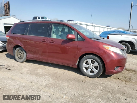 2011 Toyota Sienna LE AAS with VIN 5TDKK3DC3BS034703, listed as a Copart auction lot 52308735 with 189,822 mi miles and Salvage Title. Bid and sale history available at DreamBid. Image 4.