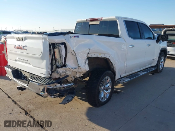 2021 GMC Sierra 1500 SLT z VIN 3GTU9DED5MG123692, wystawiony jako IAAI lot #41229854 z przebiegiem 84 651 mil mil oraz . Historia ofert i sprzedaży dostępna na DreamBid. Obrazek 4.