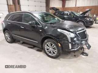2022 Cadillac XT5 AWD Premium Luxury with VIN 1GYKNDRS8NZ163725, listed as a IAAI auction lot 42295528 with 45,614 mi miles and . Bid and sale history available at DreamBid. Image 1.
