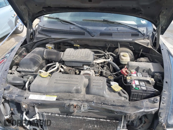 2004 Dodge Dakota SLT with VIN 1D7HL48N04S654059, listed as a IAAI auction lot 41811540 with 165,615 mi miles. Bid and sale history available at carsss.com. Image 10.