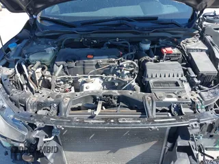 2019 Honda Civic Sport with VIN 19XFC2F89KE019683, listed as a IAAI auction lot 42055871 with 107,941 mi miles and . Bid and sale history available at DreamBid. Image 10.