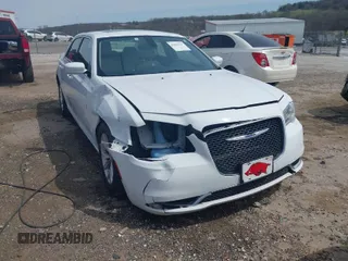 2016 Chrysler 300 Limited with VIN 2C3CCAAG7GH197829, listed as a IAAI auction lot 41853341 with 220,662 mi miles. Bid and sale history available at carsss.com. Image 1.