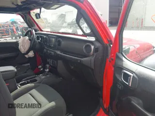2019 Jeep Wrangler Sport S z VIN 1C4GJXAG4KW652569, wystawiony jako IAAI lot #42116457 z przebiegiem 46 007 mil mil oraz . Historia ofert i sprzedaży dostępna na DreamBid. Obrazek 5.