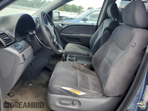 2007 Honda Odyssey EX with VIN 5FNRL38457B052131, listed as a Copart auction lot 55226575 with 165,745 mi miles and Salvage Title. Bid and sale history available at DreamBid. Image 7.
